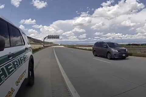 Colorado sheriff's deputy disciplined for helping immigration agents resigns, ending lawsuit