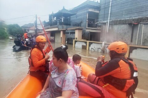 Flash floods in Indonesia leave at least 15 dead and 10 missing