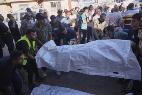 Strikes across Gaza kill at least 31 as international scholars accuse Israel of genocide