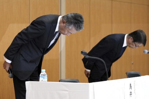 Top Japanese beverage giant Suntory’s chief resigns as he faces a drug probe