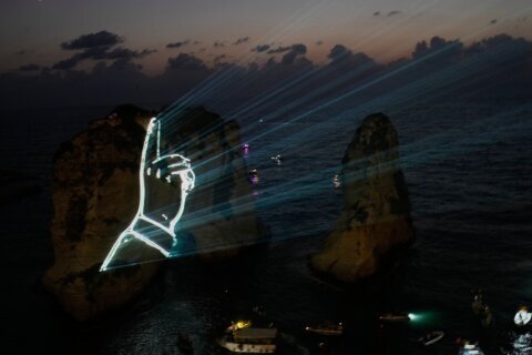 Hezbollah defies Lebanon PM’s ban to honor fallen leaders with coastal light show