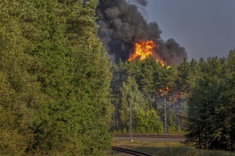 Explosions heard in Lithuania’s capital after railcars loaded with liquefied gas catch fire