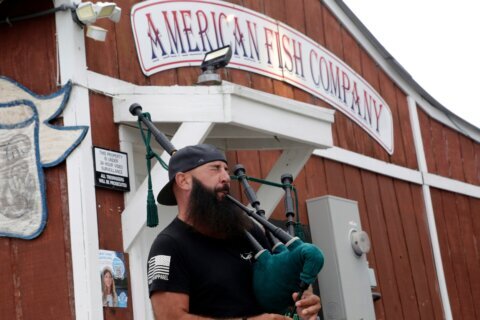 Marine veteran charged in deadly North Carolina waterfront shooting appears subdued in court