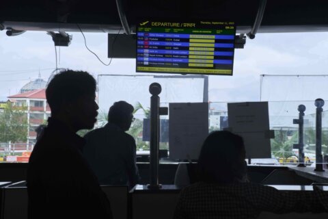 Grieving families of protesters killed in Nepal seek justice as some people try to leave