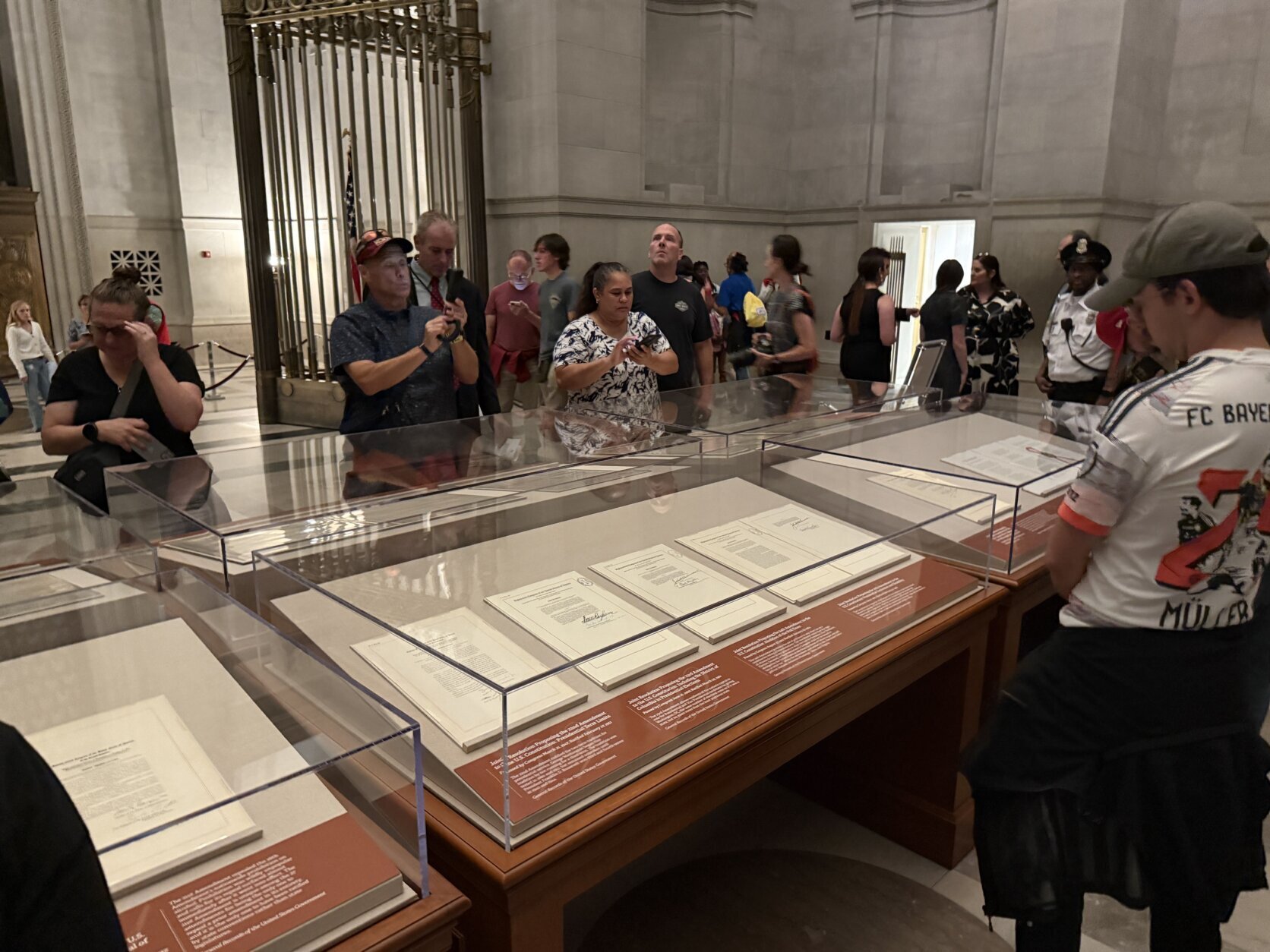 Visitors seeing the Constitution on display