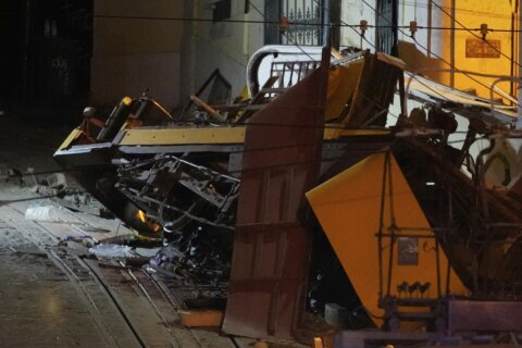 Portuguese investigators search for cause of Lisbon streetcar crash that killed 16