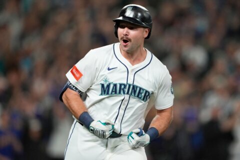 Cal Raleigh delivers decisive hit in return from injured list as Mariners top Orioles 3-1