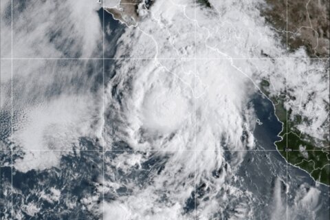 Lorena is downgraded to a tropical storm but still poses a flooding and mudslide threat to Mexico