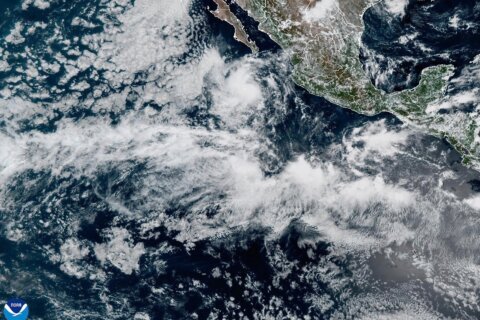 Mario restrengthens to a tropical storm off Mexico's Pacific coast but not threatening land