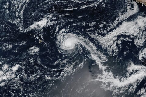 Kiko weakens into a tropical storm but brings dangerous surf to Hawaii