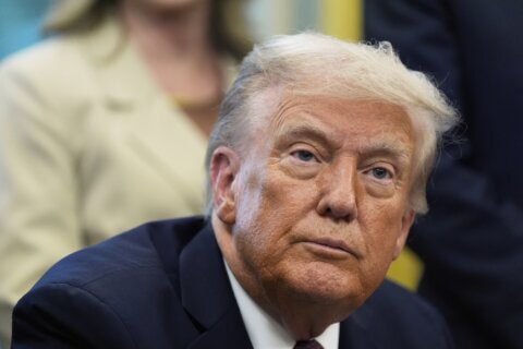 Trump wouldn't call Minnesota governor after Democrat was slain but now blames him for raised flags