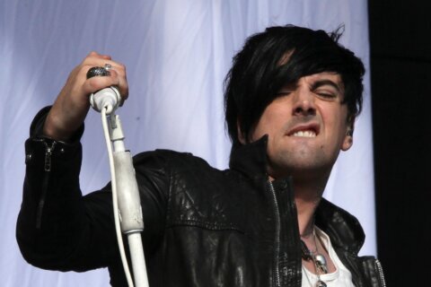UK police arrest 2 in stabbing death of former Lostprophets singer in prison