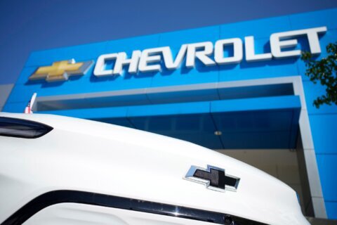 GM boosts full-year outlook as it foresees a smaller impact from tariffs and 3Q results top Street