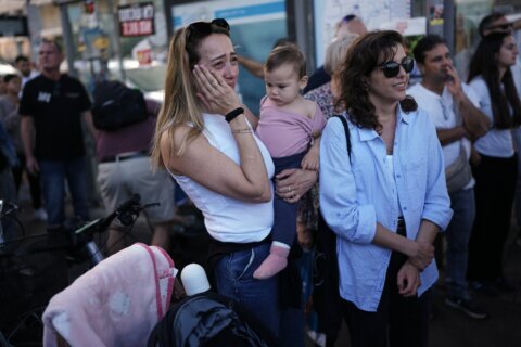 From a hilltop village and across Israel: Tears of joy as the living hostages are returned