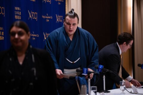 A 21-year-old Ukrainian-born sumo wrestler is surging to the top of the rankings in Japan