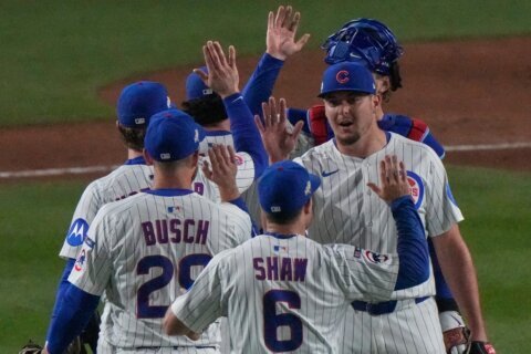 Cubs use 4-run 1st inning to top the Brewers 4-3 and avoid NL Division Series sweep