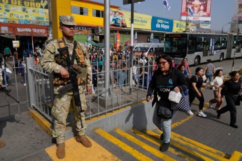 Military and police patrol streets of Peru’s capital as state of emergency begins
