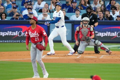 Ohtani and Hernández power Dodgers past Reds 10-5 with 2 homers each in Wild Card Series opener