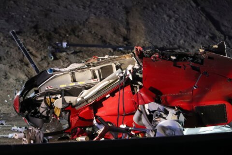 California fire captain enlists motorists to lift downed chopper after hearing trapped medic groan