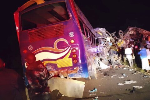 Crash of buses and other vehicles in western Uganda kills 46 people