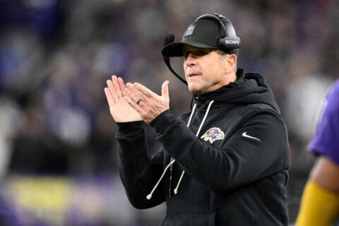 John Harbaugh and the Giants are working on a deal to make him their coach, AP sources say