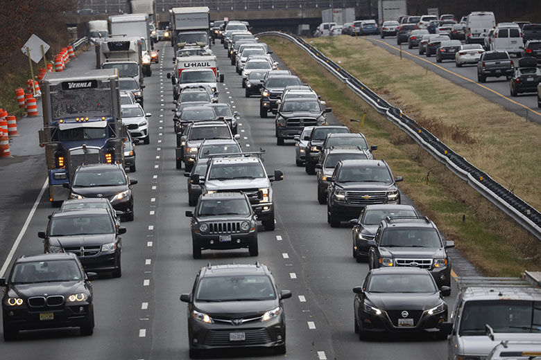 As flight restrictions end, record Thanksgiving travel projected on roads and airports