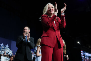 spanberger claps on stage