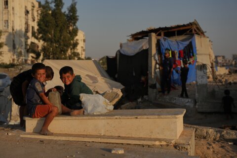 In Gaza cemeteries, some displaced Palestinians live among the dead