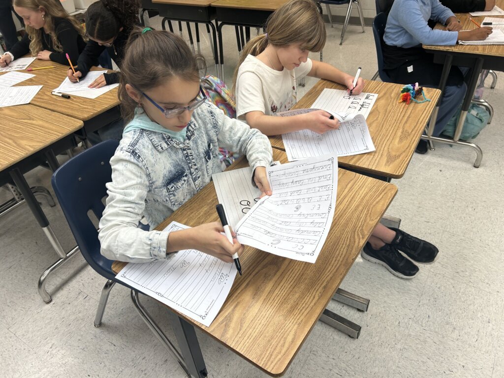 Fairfax Co. middle school’s Cursive Club offers chance to learn lost art