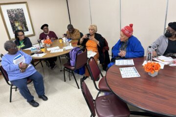 groups of people sat at tables