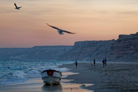 Attackers board a ship off the coast of Somalia after firing rocket-propelled grenades