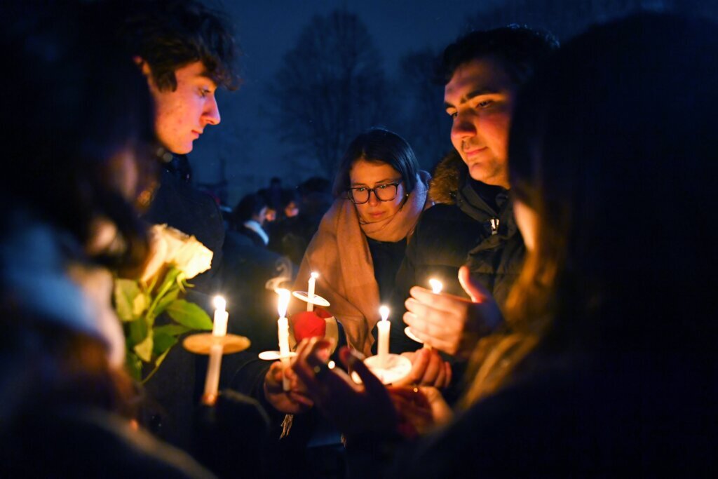 Search for the Brown University shooter continues as questions swirl about campus security