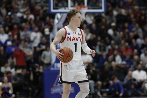Benigni has 23 in Navy’s 76-55 win over Bucknell