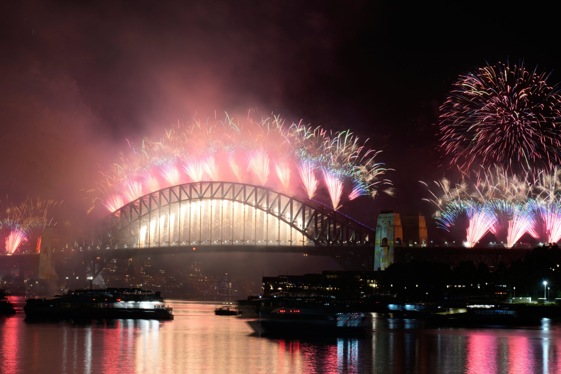 Fireworks burst over the Sydney Harbour Bridge