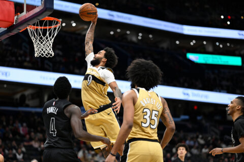 Champagnie scores season-high 20 points to lead the Wizards to a 119-99 win over the Nets