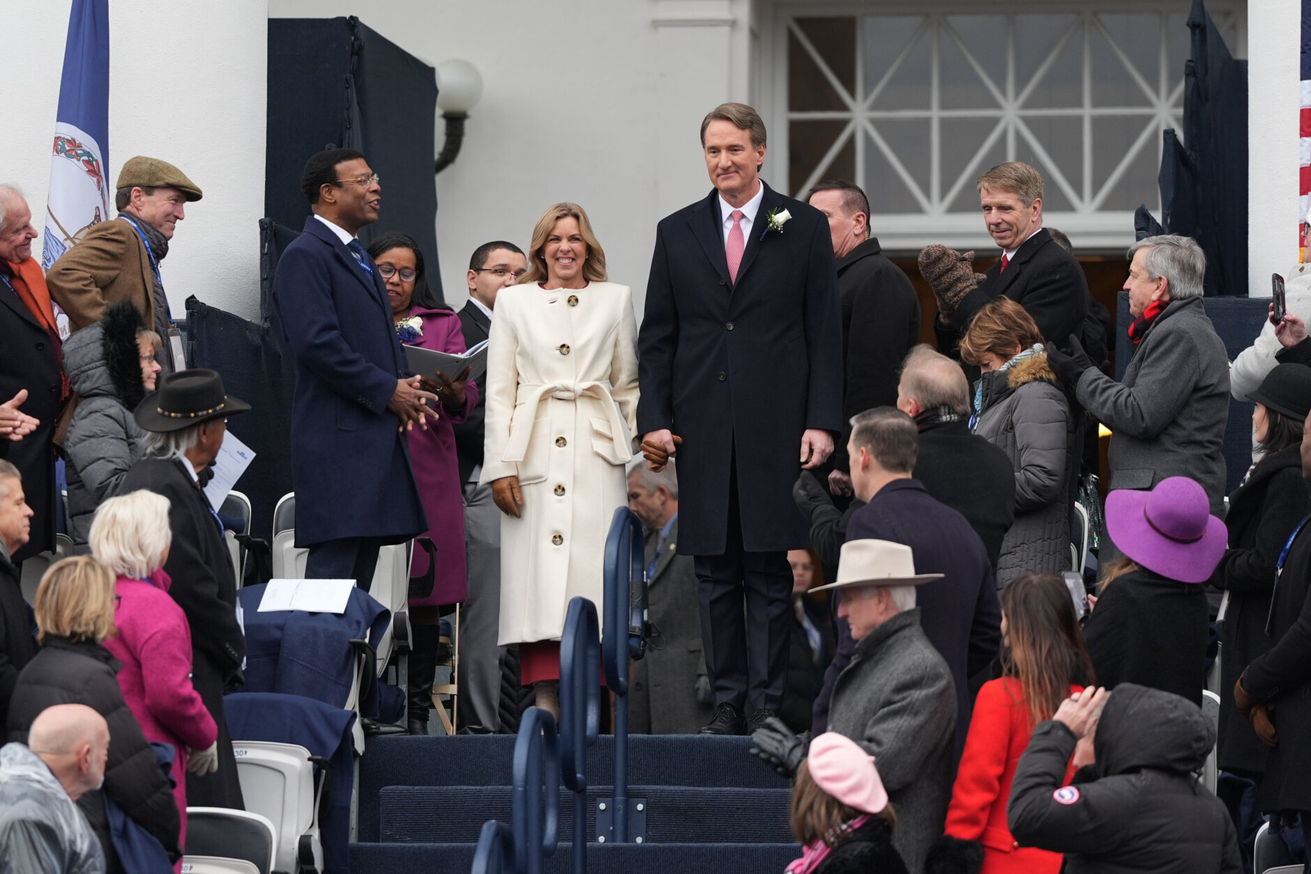 Va. Gov. Glenn Youngkin arrives with his wife before Virginia gov.-elect Abigail Spanberger inauguration at the Capitol in Richmond, Va., Saturday Jan. 17, 2026. (AP Photo/Stephanie Scarbrough)