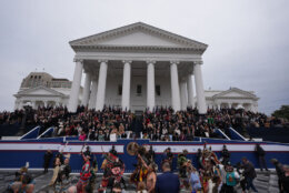 Participants take part in an inaugural ceremony after Abigail Spanberger was sworn in as Virginia's first female governor, at the Capitol in Richmond Va., Saturday, Jan. 17, 2026.(AP Photo/Stephanie Scarbrough)