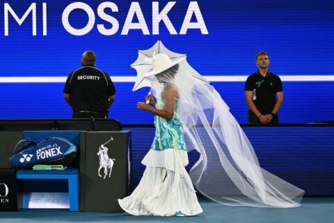 Naomi Osaka tones down her walk-on outfit for second-round match at the Australian Open