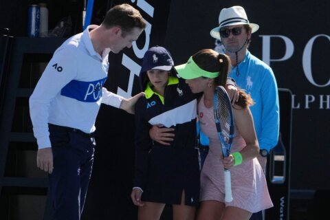 Zeynep Sönmez rushes to aid ballkid during Australian Open upset win