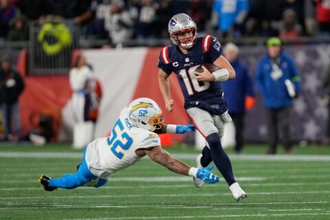 Maye throws late TD pass and Patriots’ defense roughs up Herbert, Chargers in 16-3 playoff win