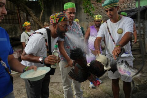 Cuba's Santeros offer gifts and ask deities for peace as tensions rise with US