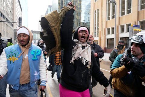 Counterprotesters chase off conservative influencer during Minneapolis immigration crackdown