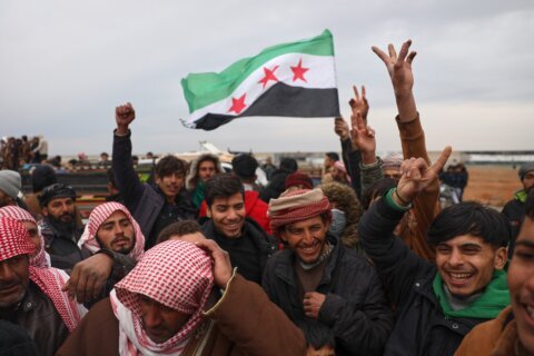 Syrian government forces enter northern towns after Kurdish fighters withdraw
