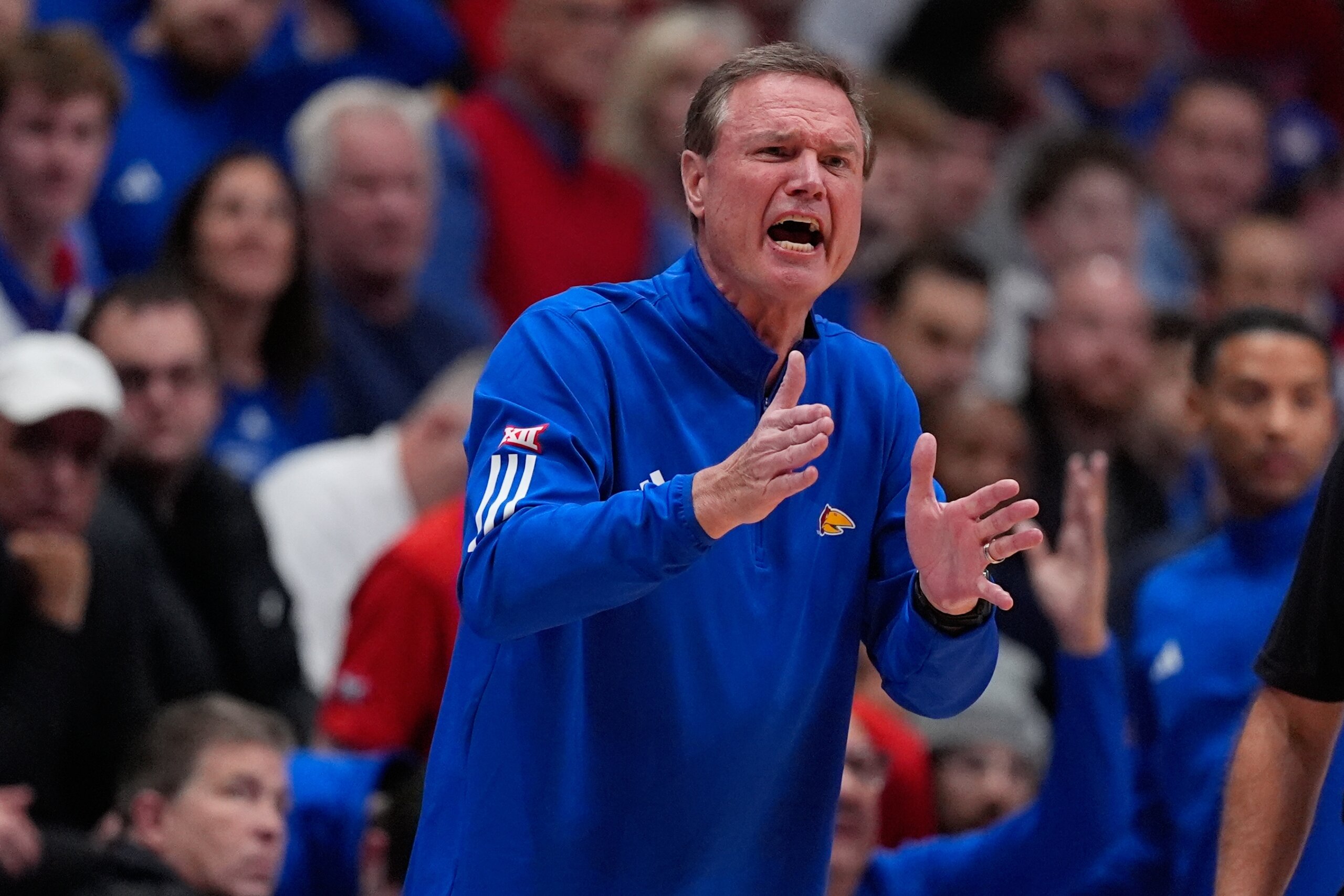 Coach Bill Self doesn’t travel with No. 19 Kansas after going to the hospital, school says