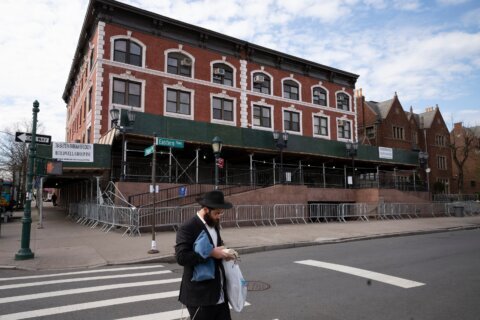 Car rams into Chabad headquarters in New York City, damaging doors