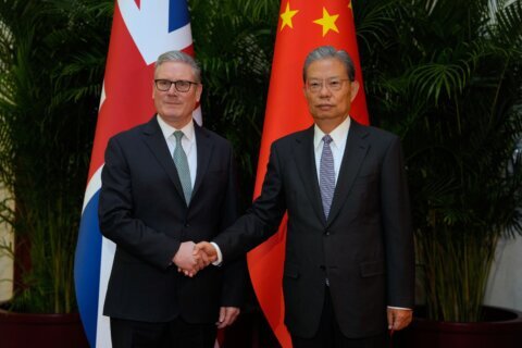 Keir Starmer meets Xi Jinping in Beijing in bid to improve UK-China relations and boost trade