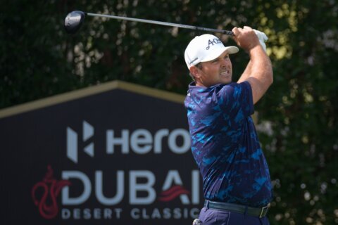 Reed leads by 4 shots at Dubai Desert Classic as McIlroy's title hopes fade and Hovland surges
