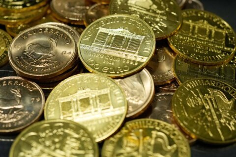 More consumers are buying or selling gold. What to know about the latest rush and swings in value
