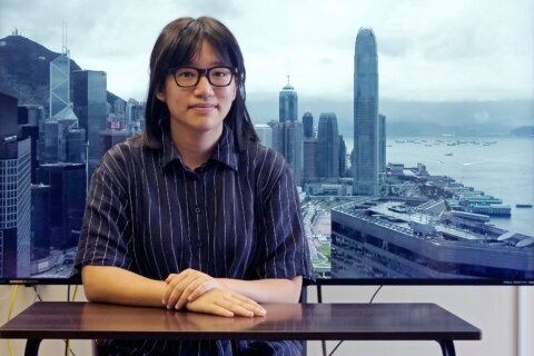 Hong Kong vigil organizer says she was seeking democracy, not end to Communist Party rule