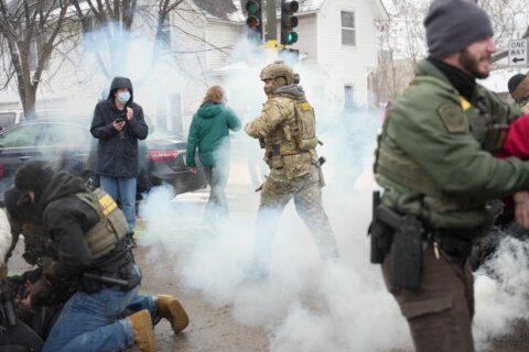 Army orders military police to get ready for a possible Minneapolis deployment, AP source says